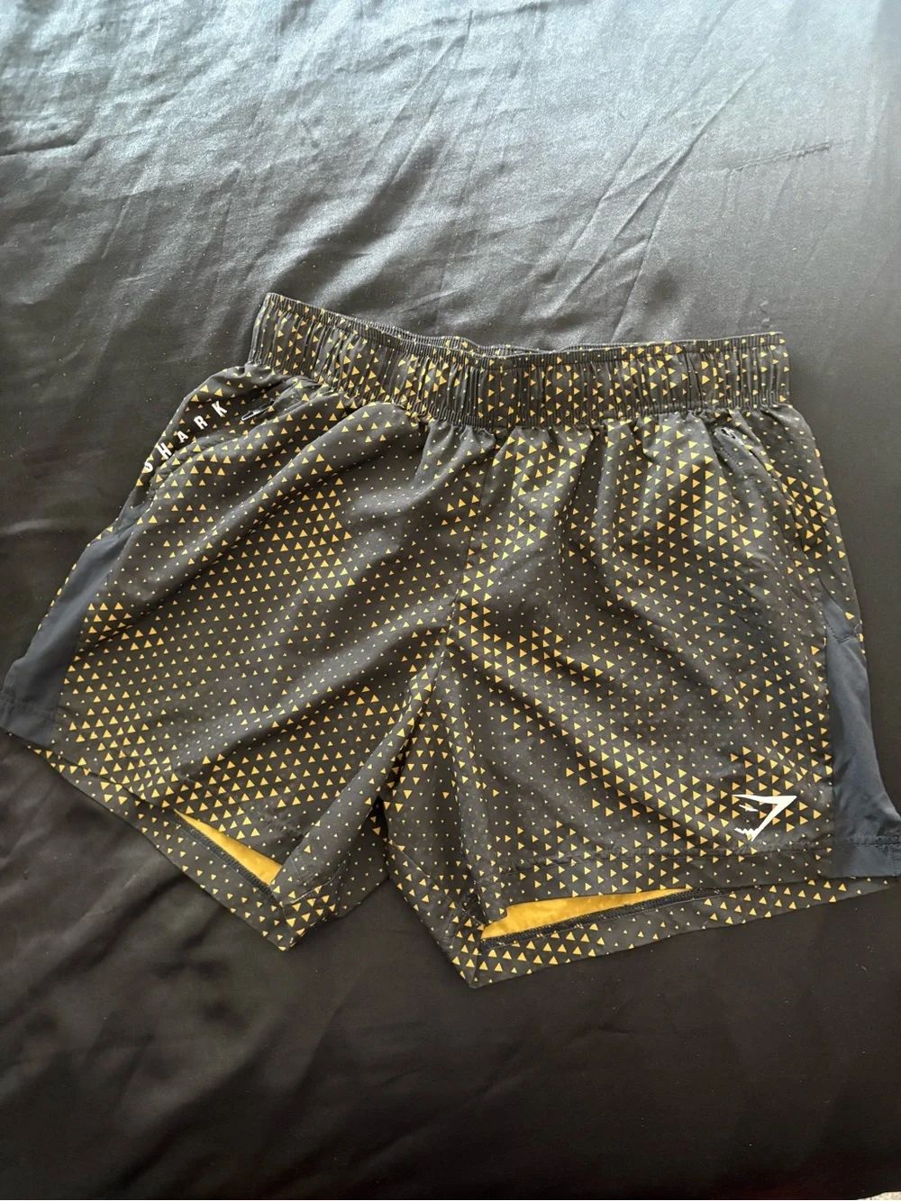 Gymshark Men’s Black Shorts with Gold Triangle Print